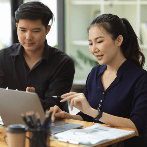 A contract is checked line by line for a certified version, using Chinese Translation Services in Virginia for business.