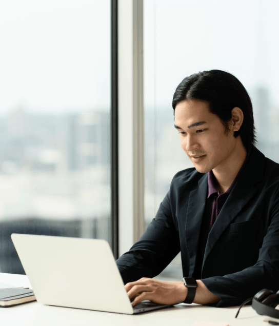 A project manager checks a certified real estate purchase agreement, using Chinese Translation Services in Virginia.
