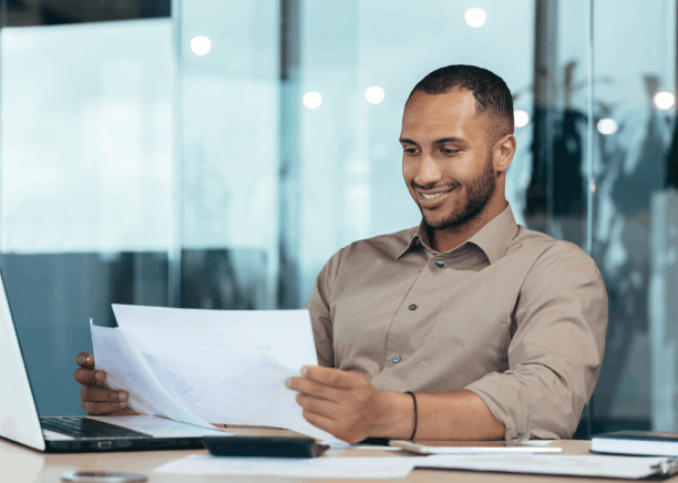 A finance manager reviews a translated annual report, using Spanish Translation Services in Virginia for financial clarity.
