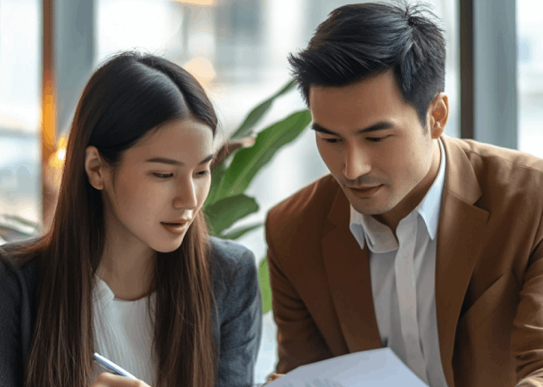 A translator marks clauses in a Korean contract draft, using Korean Translation Services in Virginia for legal precision.