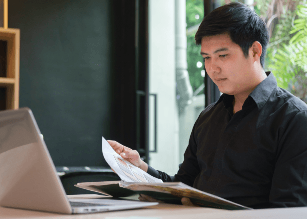 A translator checks a Latin America legal brief in Chinese, using Chinese Translation Services in Virginia for court use.
