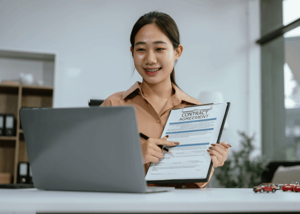 A customer assembles a USCIS packet with a birth certificate, using Korean Translation Services in Virginia for filing.